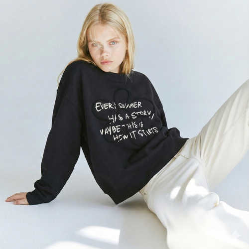 Black Graphic Sweatshirt with Floral Accent